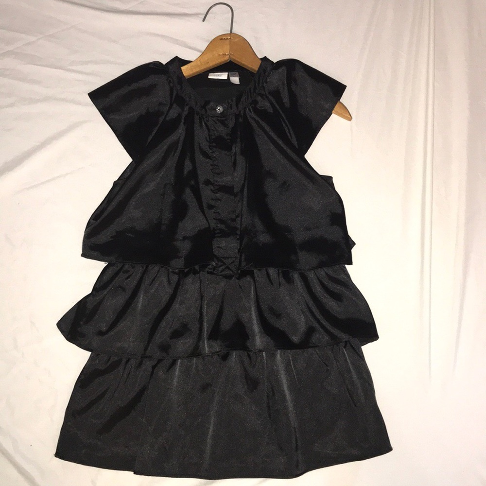 Sleeveless PIPER tiered blouse.